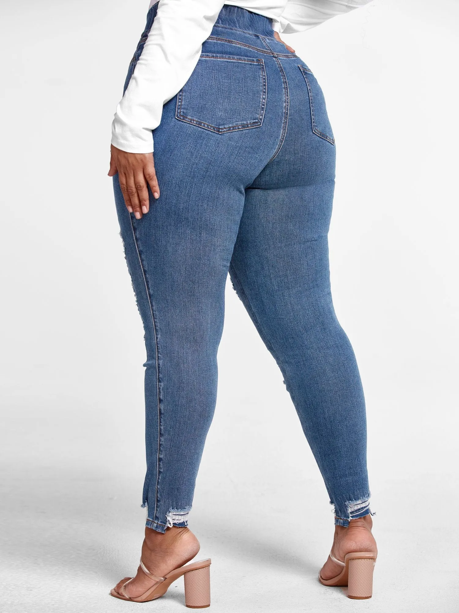 High Rise Medium Wash Destructed Jeggings - Short Inseam