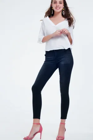 JEANS NEGROS LAVADOS AJUSTADOS