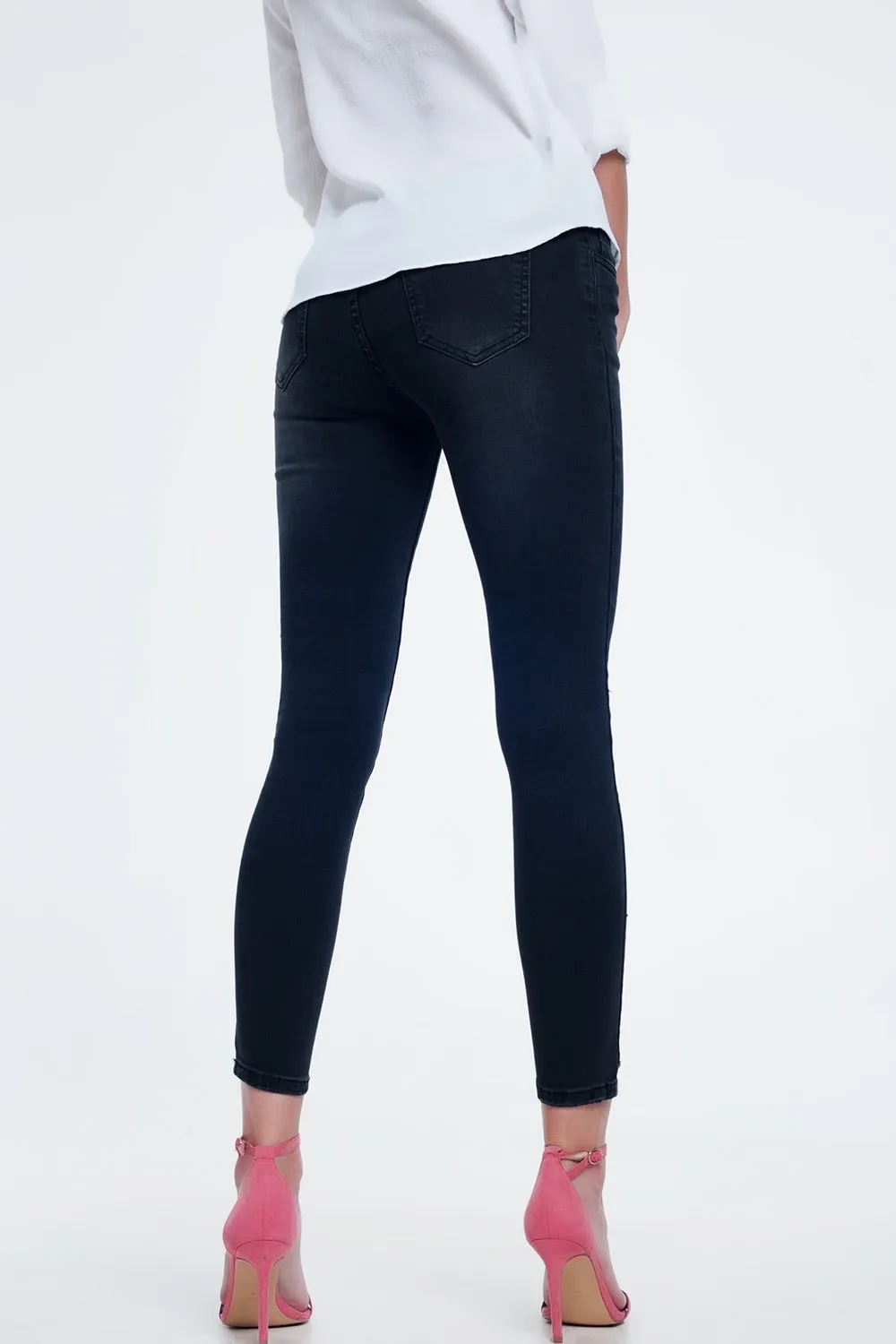 JEANS NEGROS LAVADOS AJUSTADOS